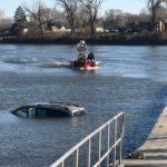 CAR IN RIVER BOAT RAMP