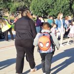 STUDENT WITH BACKBACK