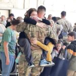ARMY GUARD FAMILY HUG