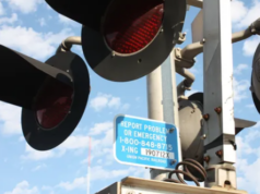 SMALL BLUE SIGNS AT RAIL CROSSINGS CAN HELP SAVE LIVES